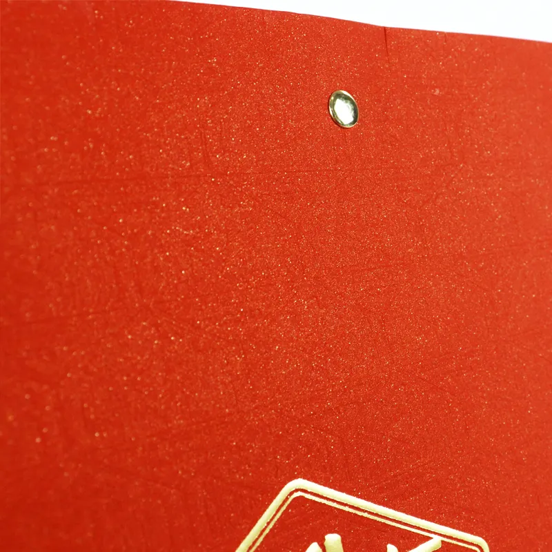 Textured red specialty paper surface for custom tea packaging gift bags