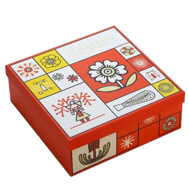 Red cosmetic gift box with colorful illustrated lid and fitted tray