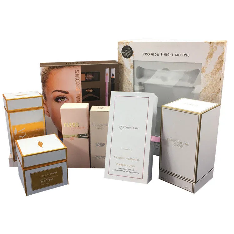 A collection of skincare products in coordinated white cartons and rigid boxes