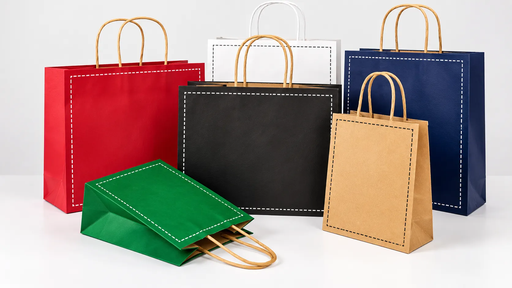 Paper shopping bags with different handle styles