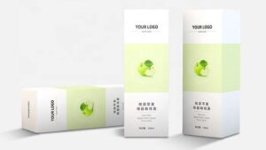 Minimalist skincare packaging in white and pale green folding cartons